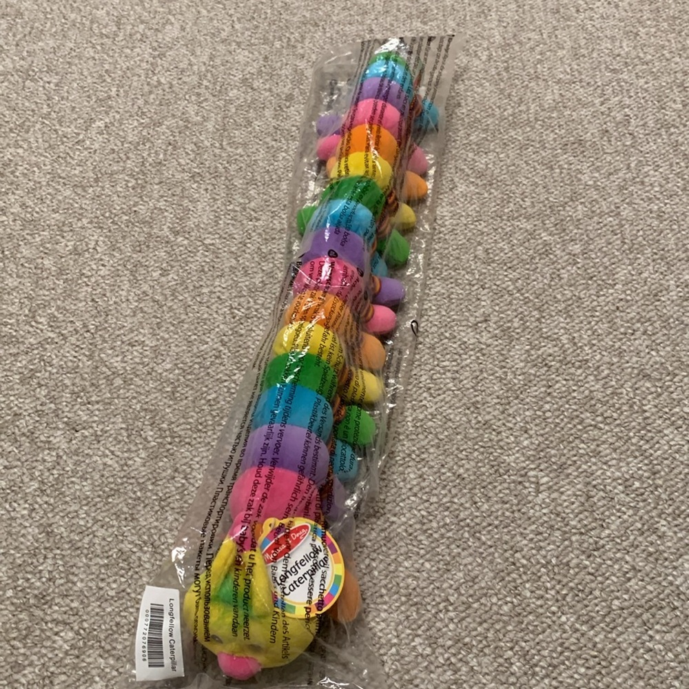 Melissa and Doug Longfellow caterpillar. Brand new still in the package.